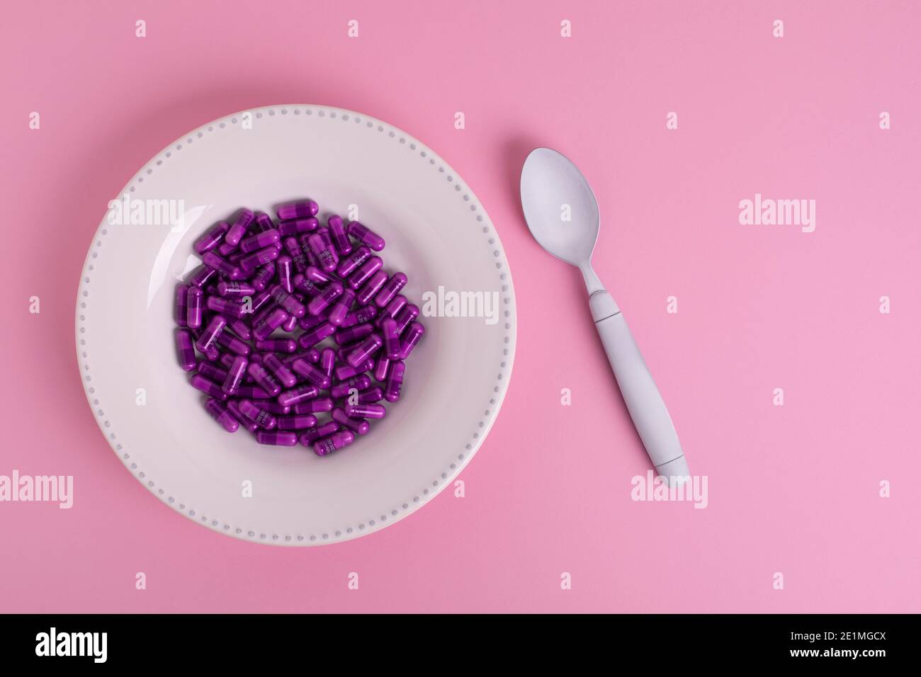 White plate filled with pills, addiction problem concept Stock Photo