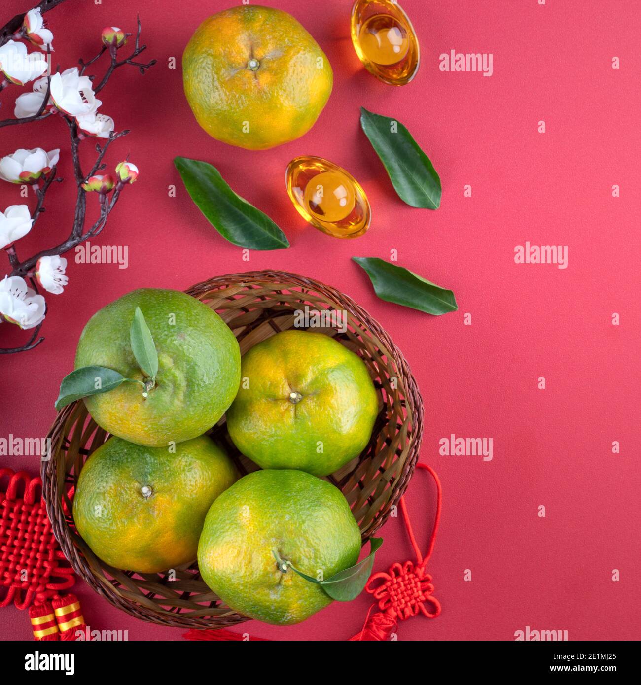 Top view of fresh ripe tangerine mandarin orange with fresh leaves on