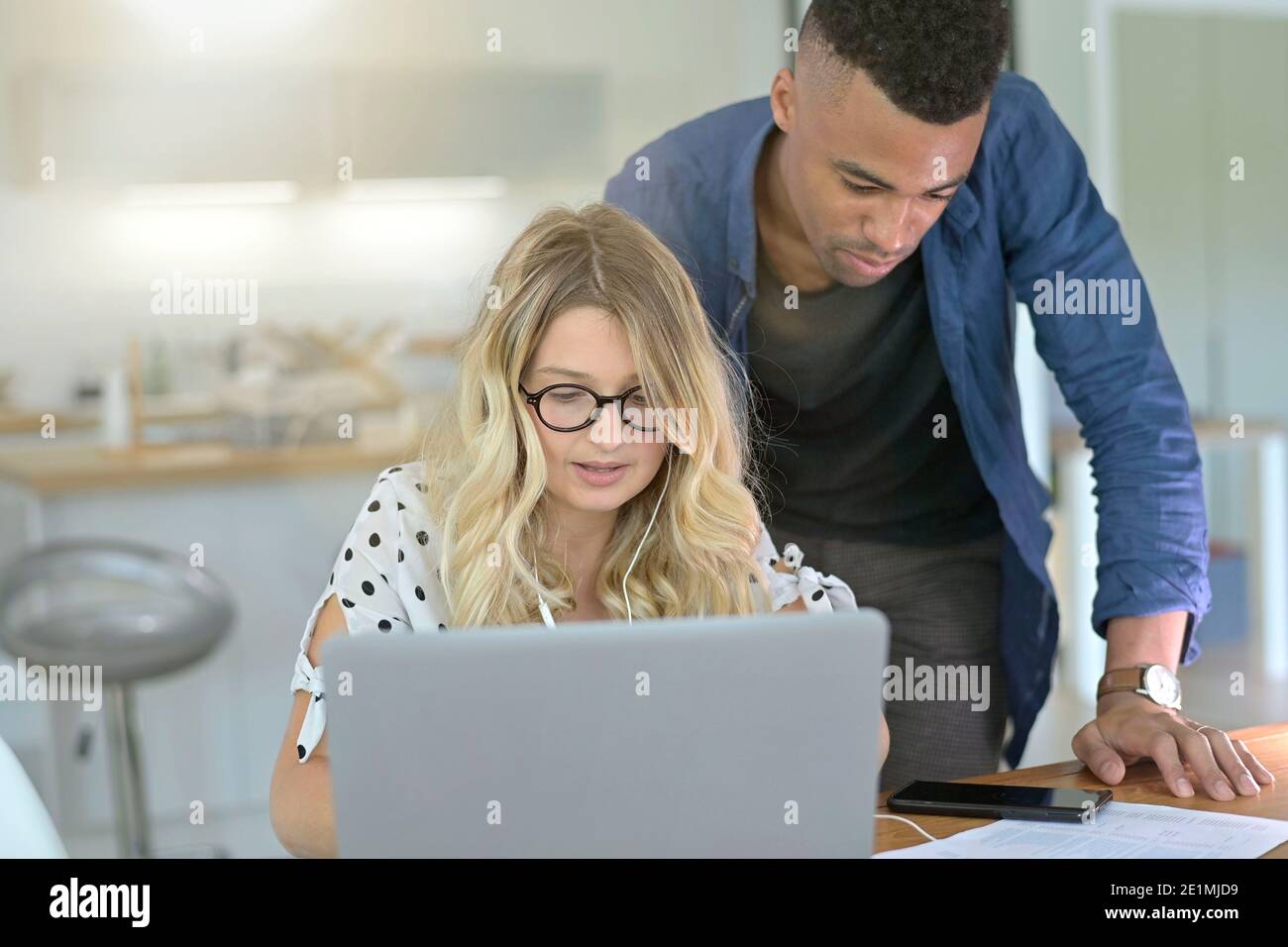 young woman working in home-office Stock Photo