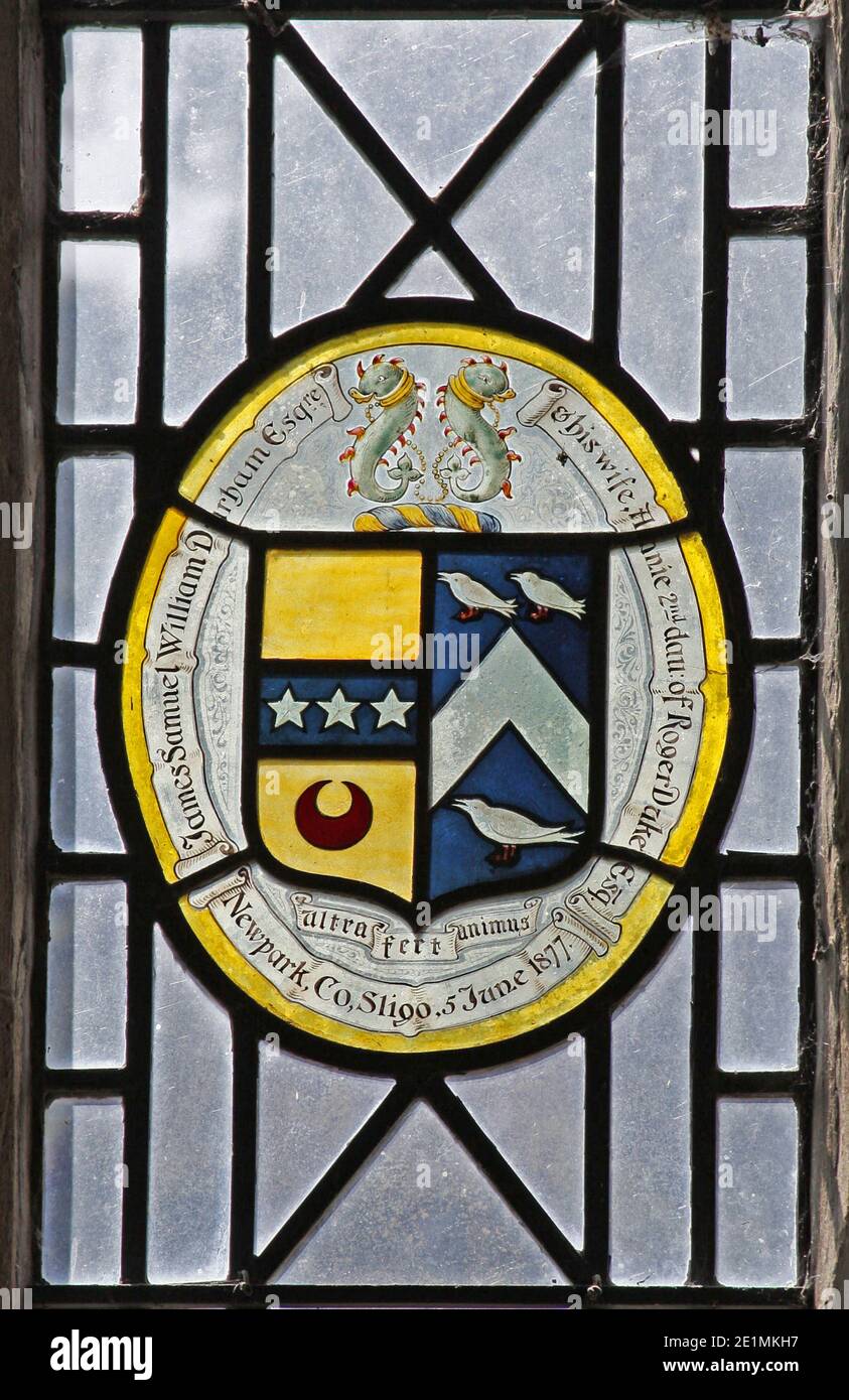 A stained glass window depicting the coats of arms of the Durham Family impaling Duke, All Saints Church, Ladbroke, Warwickshire. Stock Photo