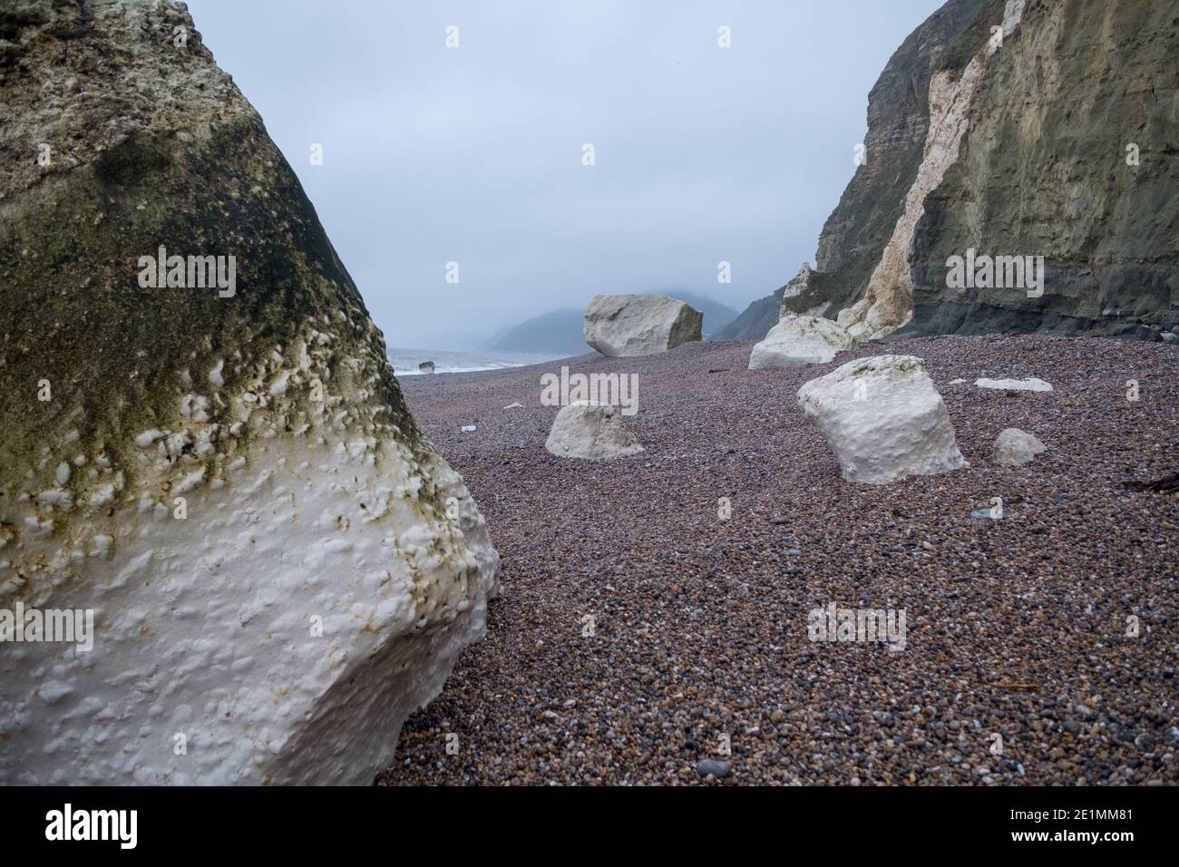 Hooken Cliff, white chalk Boulders on Branscombe Beach, part of the Jurassic Coastline during Autumn, South-East Devon, England Stock Photo