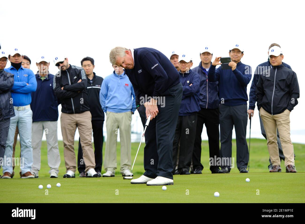 Scottish professional golfer Colin Montgomerie, OBE coaching a corprate group Stock Photo