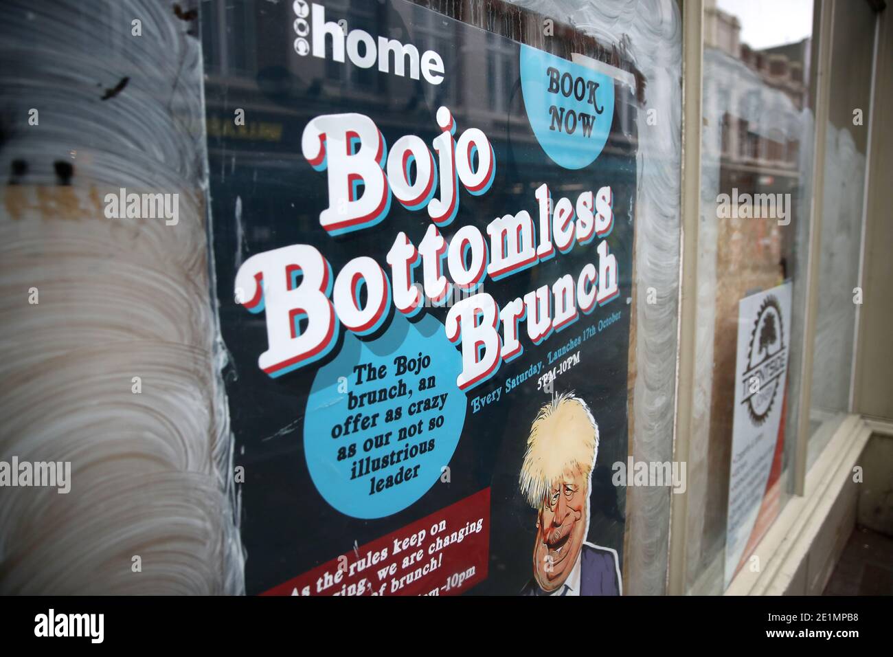 A sign advertising a 'Bojo Bottomless Brunch' in Lincoln city centre during England's third national lockdown to curb the spread of coronavirus. Under increased measures people can no longer leave their home without a reasonable excuse and schools must shut for most pupils. Stock Photo