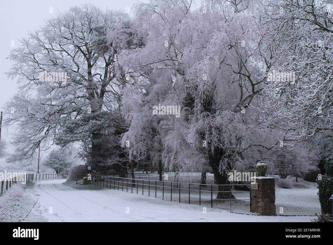 A Country Lane in the Snow, Kinwarton,near Alcester, Warwickshire, UK. Shakespeare's County, a cold Christmas scene. Stock Photo