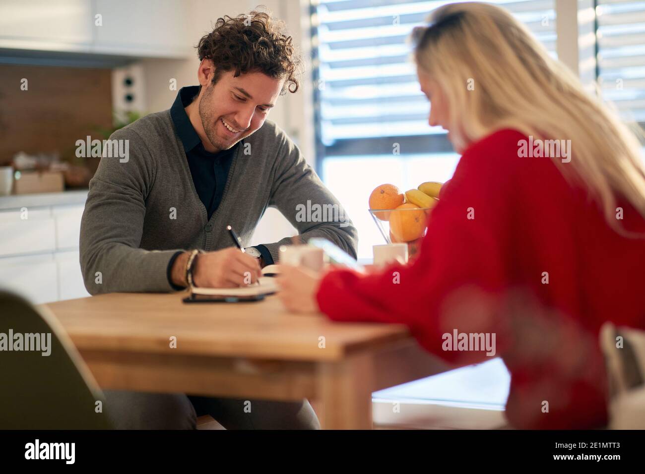 Happy couple spending time together at home; Bonding couple concept Stock Photo