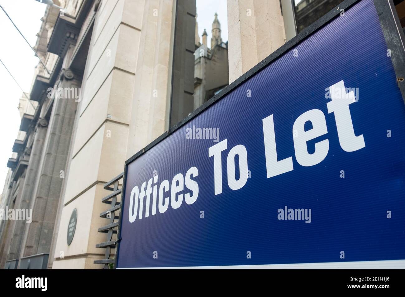 Offices to Let sign in built up city area Stock Photo