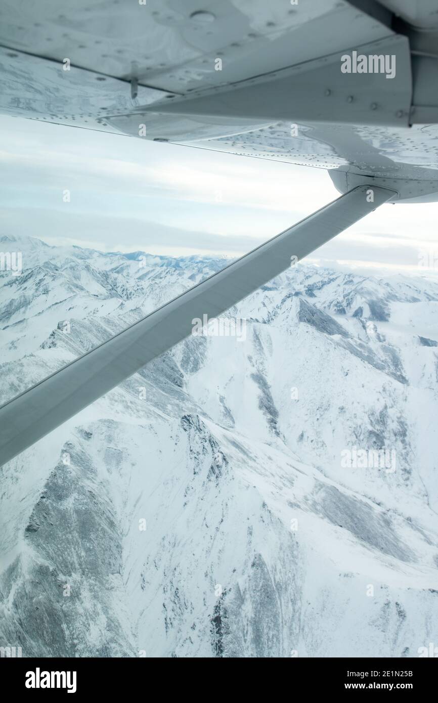 Flying over Brooks Mountain Range in the Arctic Circle on the way to