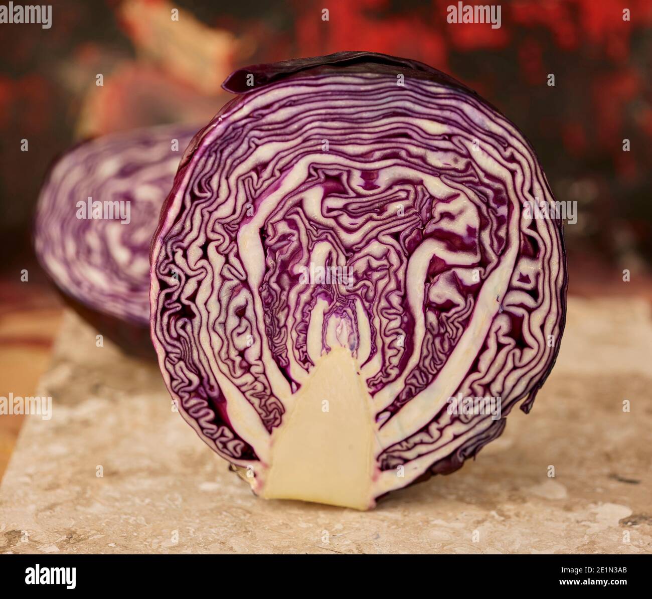 Sliced Red cabbage showing intricate pattern, food ingredient still-life Stock Photo