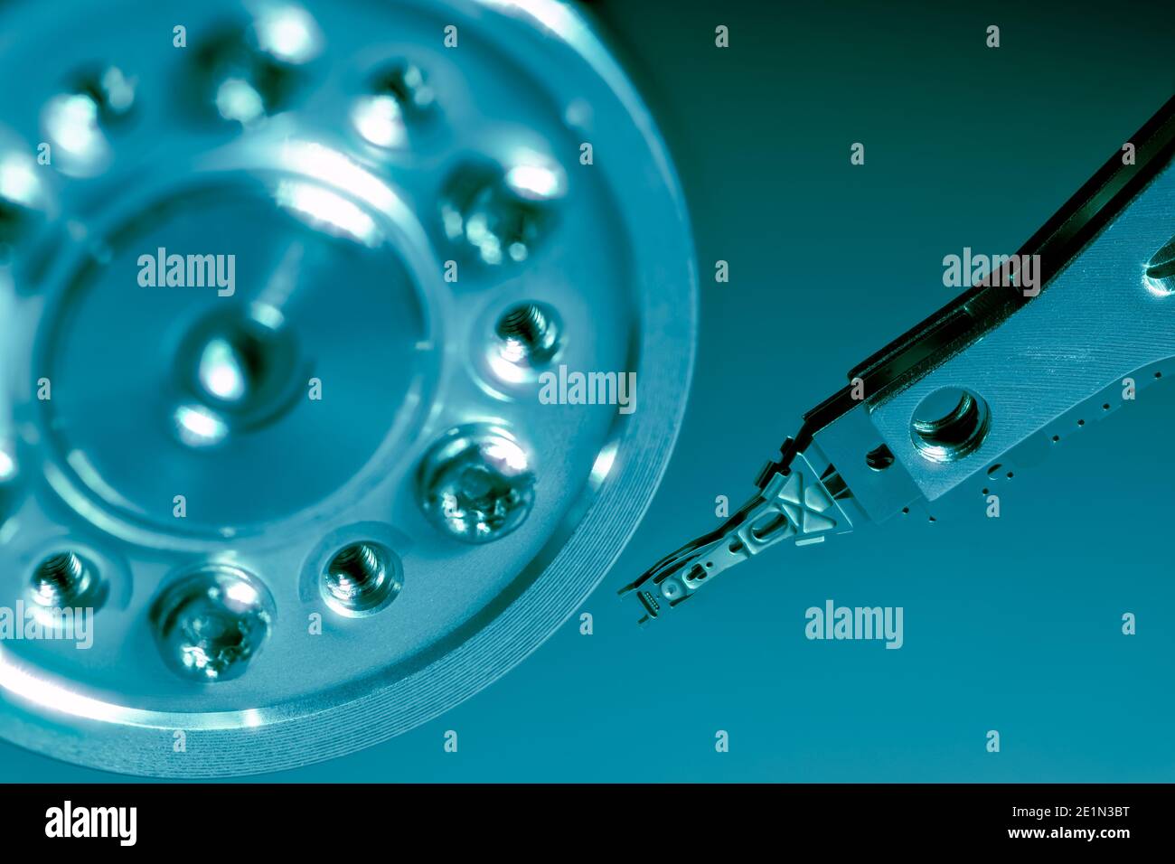 Macro of an open computer hard drive with the read/write head Stock Photo