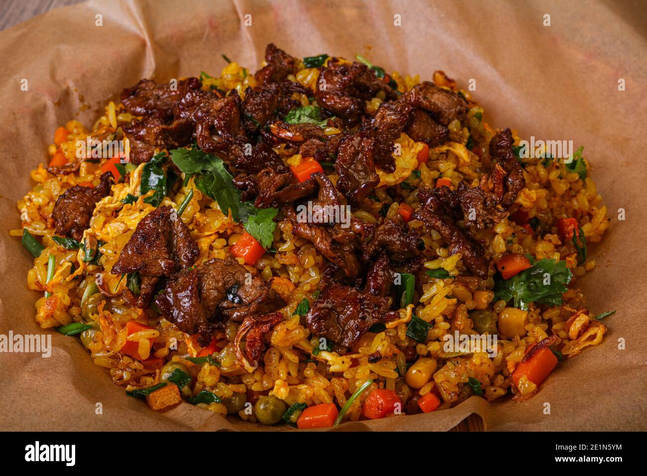 Asian cuisine - Fried Rice with beef and vegetables Stock Photo - Alamy