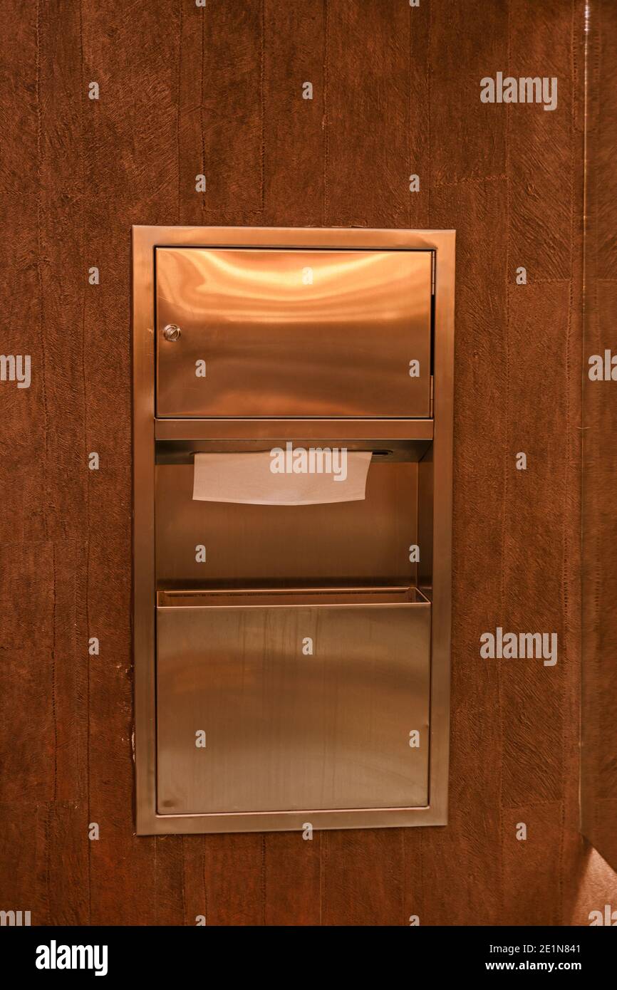 Wall-mounted paper towel dispenser in public toilet Stock Photo - Alamy