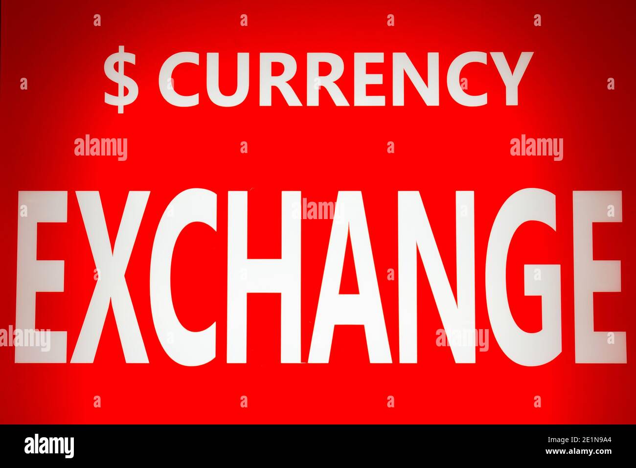 Exchange currency white text on red background Stock Photo Alamy
