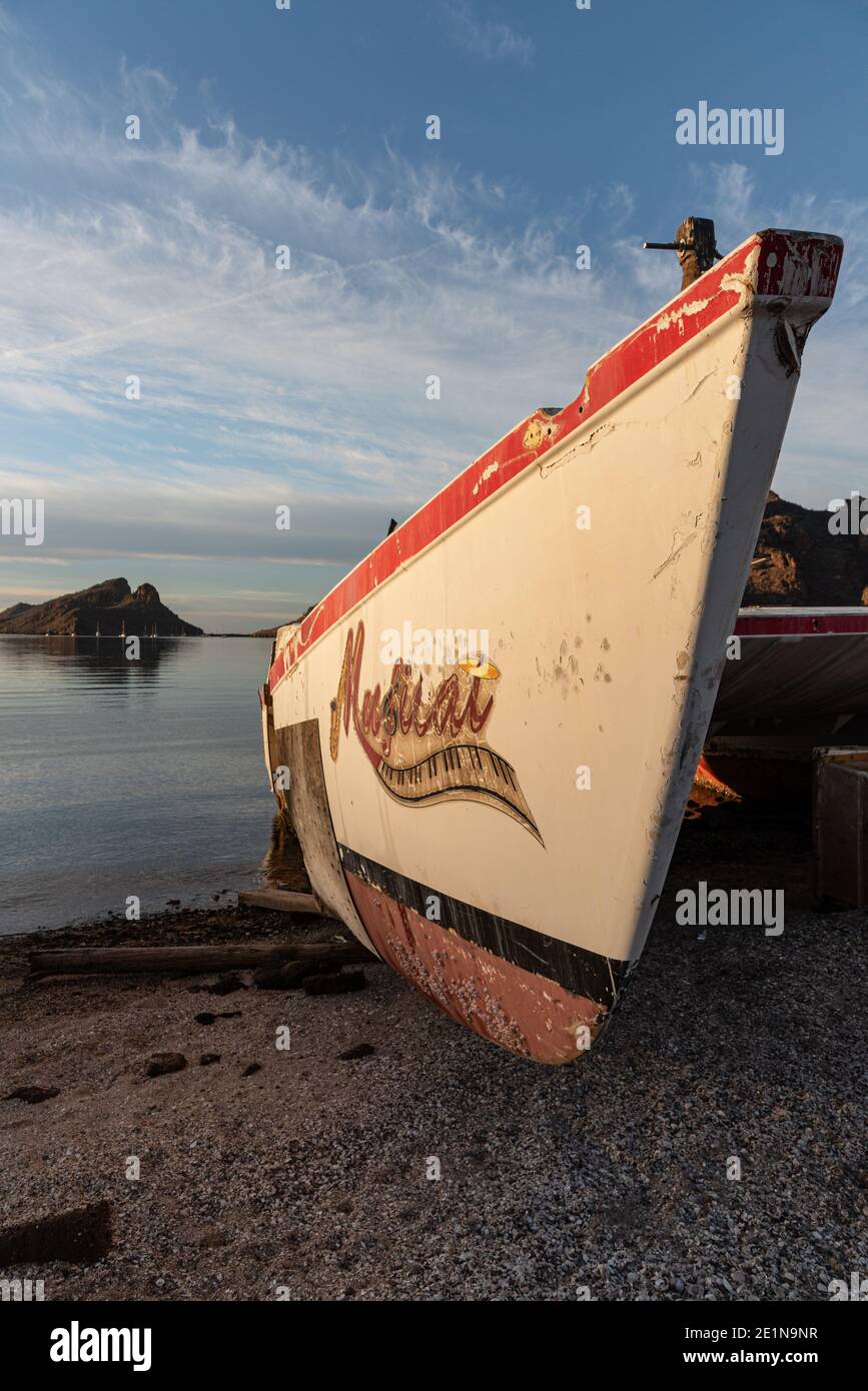 Closeup of the damaged hull of a shipwrecked catamaran on the beach, San Carlos, Sonora, Mexico. Stock Photo