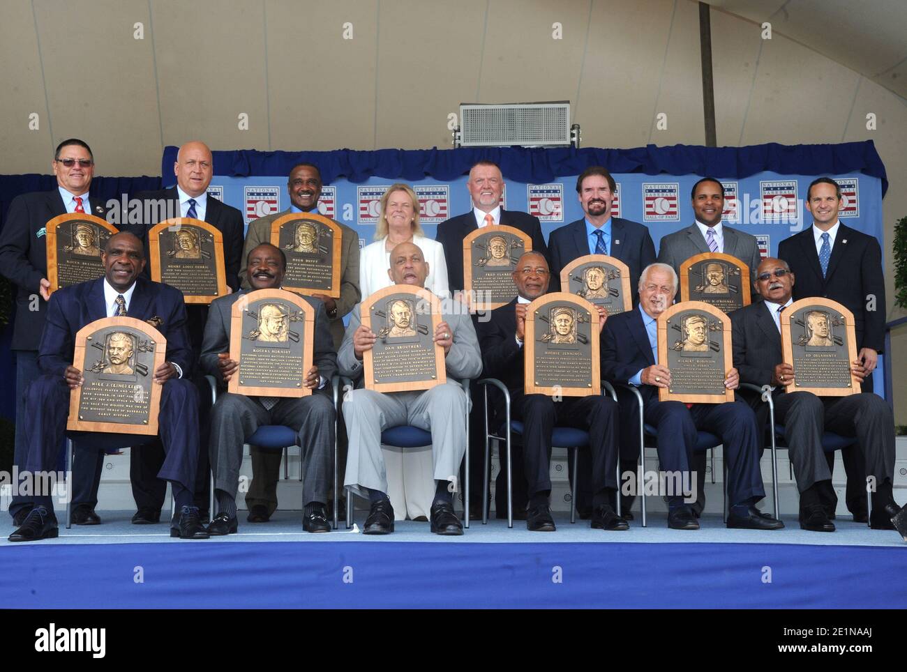 **FILE PHOTO** Tommy LaSorda Has Passed Away. New York, NY-July 28: Hall of Fame members (L-R) Andre Dawson, Joe Morgan, Orlando Cepeda, Ozzie Smith, Tommy LaSorda, Billy Williams, (top Row) Carlton Fisk, Cal Ripken, Jim rice, Jane Clark, Bert Blyleven, Wade Boggs, Barry Larkin and Jeff Idelson attend the National Baseball Hall of Fame induction ceremony on July 28, 2013 in Cooperstown, New York. Credit: George Napolitano/MediaPunch Stock Photo