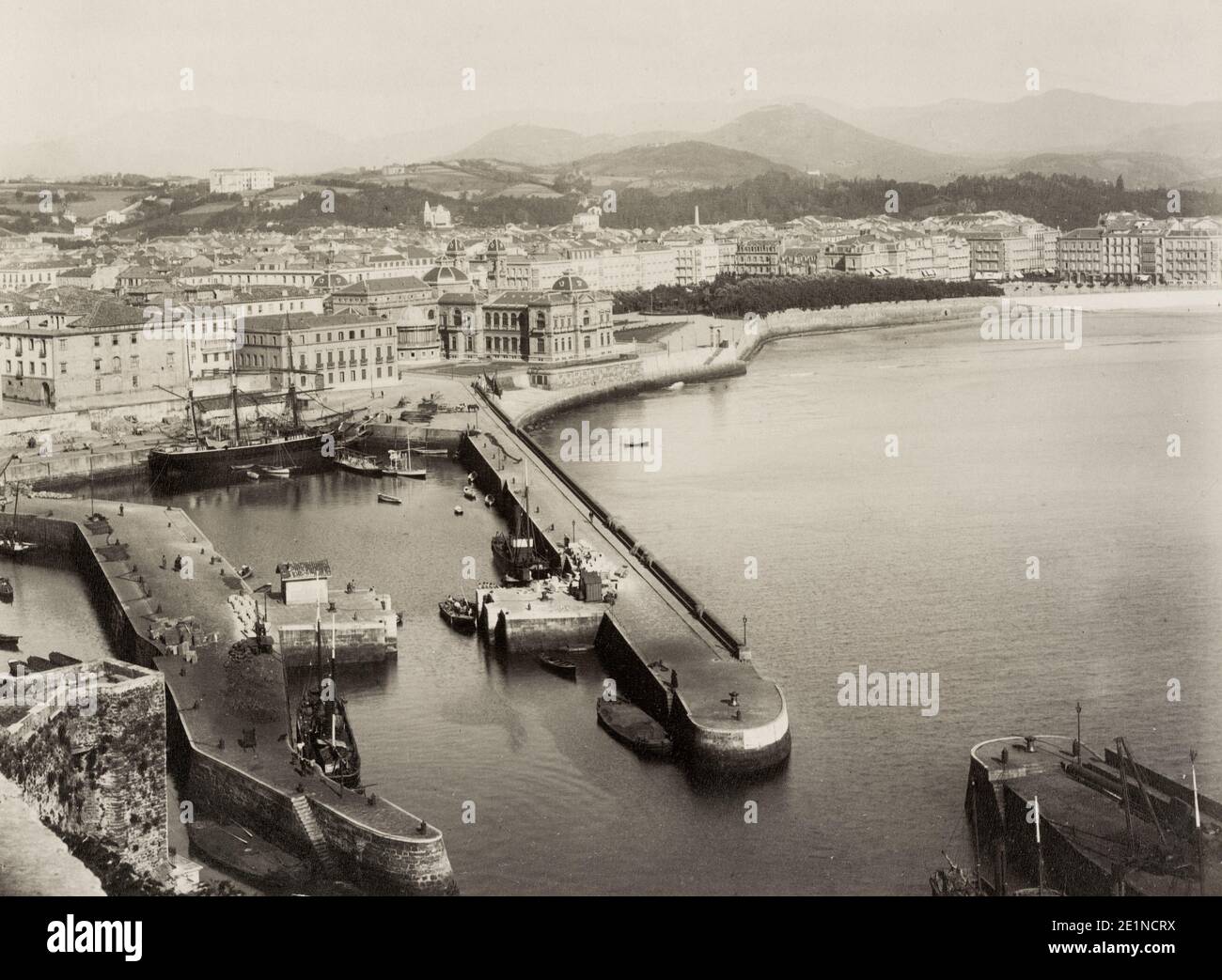 19th century vintage photograph: harbour wall at San Sebastián or Donostia, a coastal city and municipality located in the Basque Autonomous Community, Spain. It lies on the coast of the Bay of Biscay, 20 km (12 miles) from the French border. Stock Photo