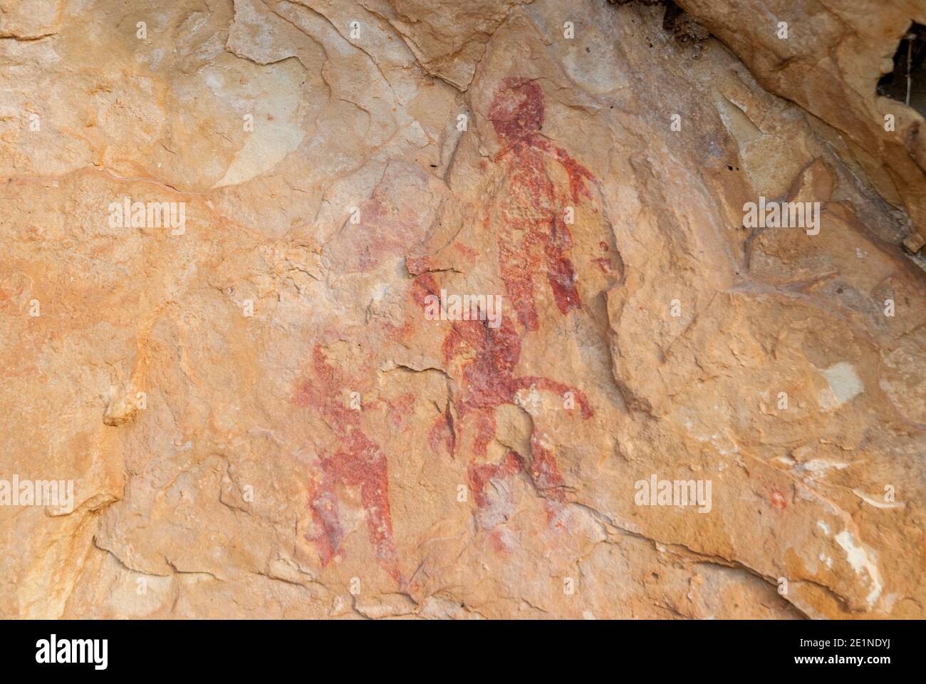 Red rock paintings in the lapel of the eagle on limestone rock in the gorges of the duraton dated to the bronze age Stock Photo