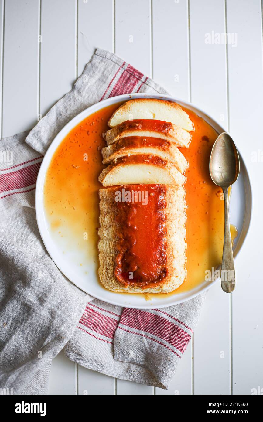 Homemade Flan Dessert with Caramel Sauce knowed in Italy as 'latte alla portoghese' and in Romania as 'crema de zahar ars'. Stock Photo