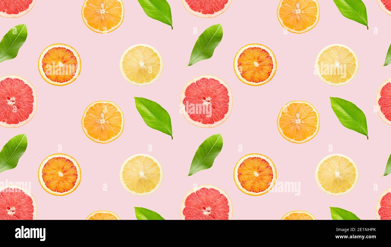 seamless pattern with citrus and leaves on a light blue background. Stock Photo