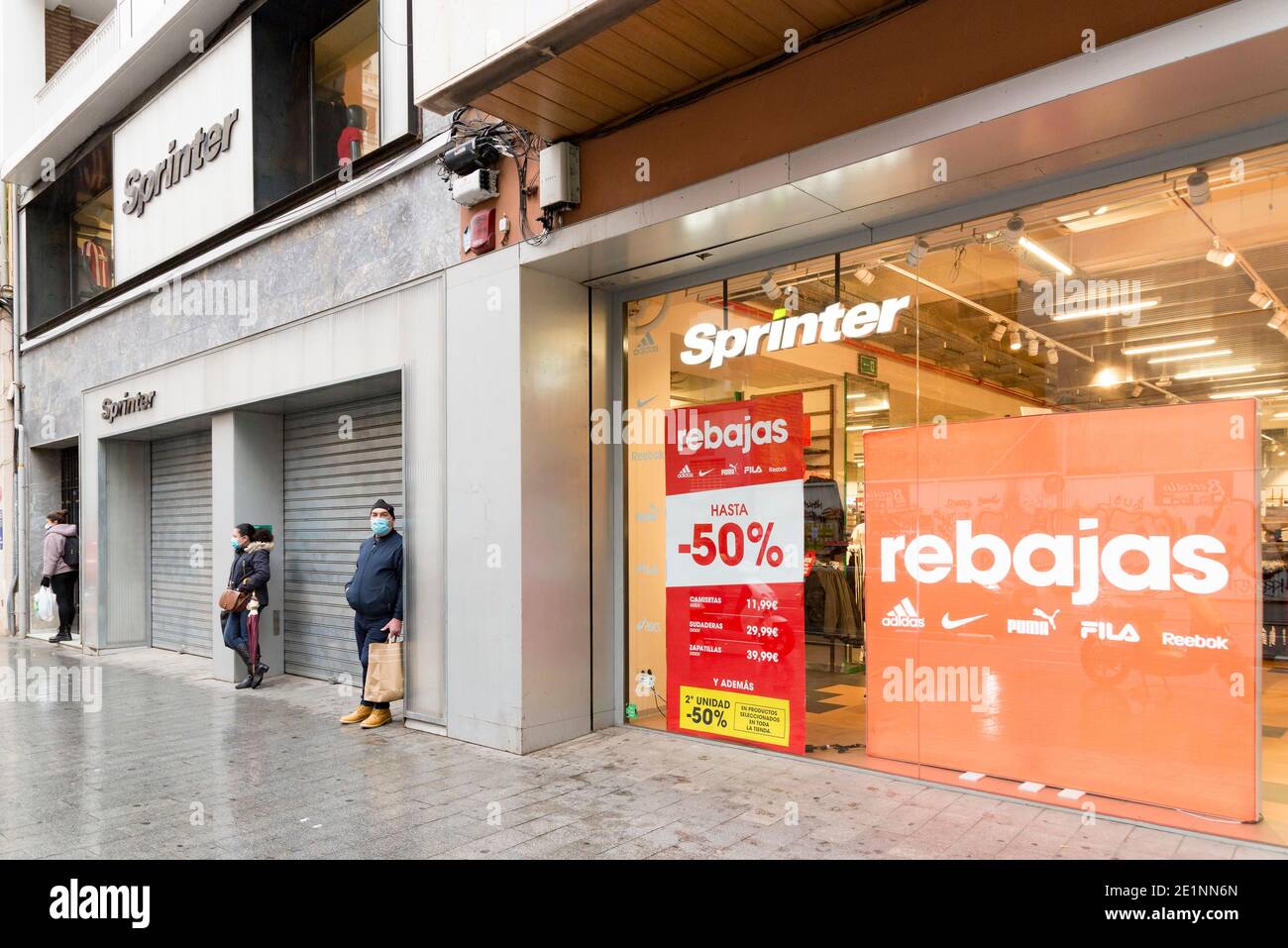 Valencia, Spain. 8th Jan, 2021. People wait in front of the Sprinter store  during the winter sales.In the last weeks of Christmas, the cases of  Covid19 in Valencia have increased, this has