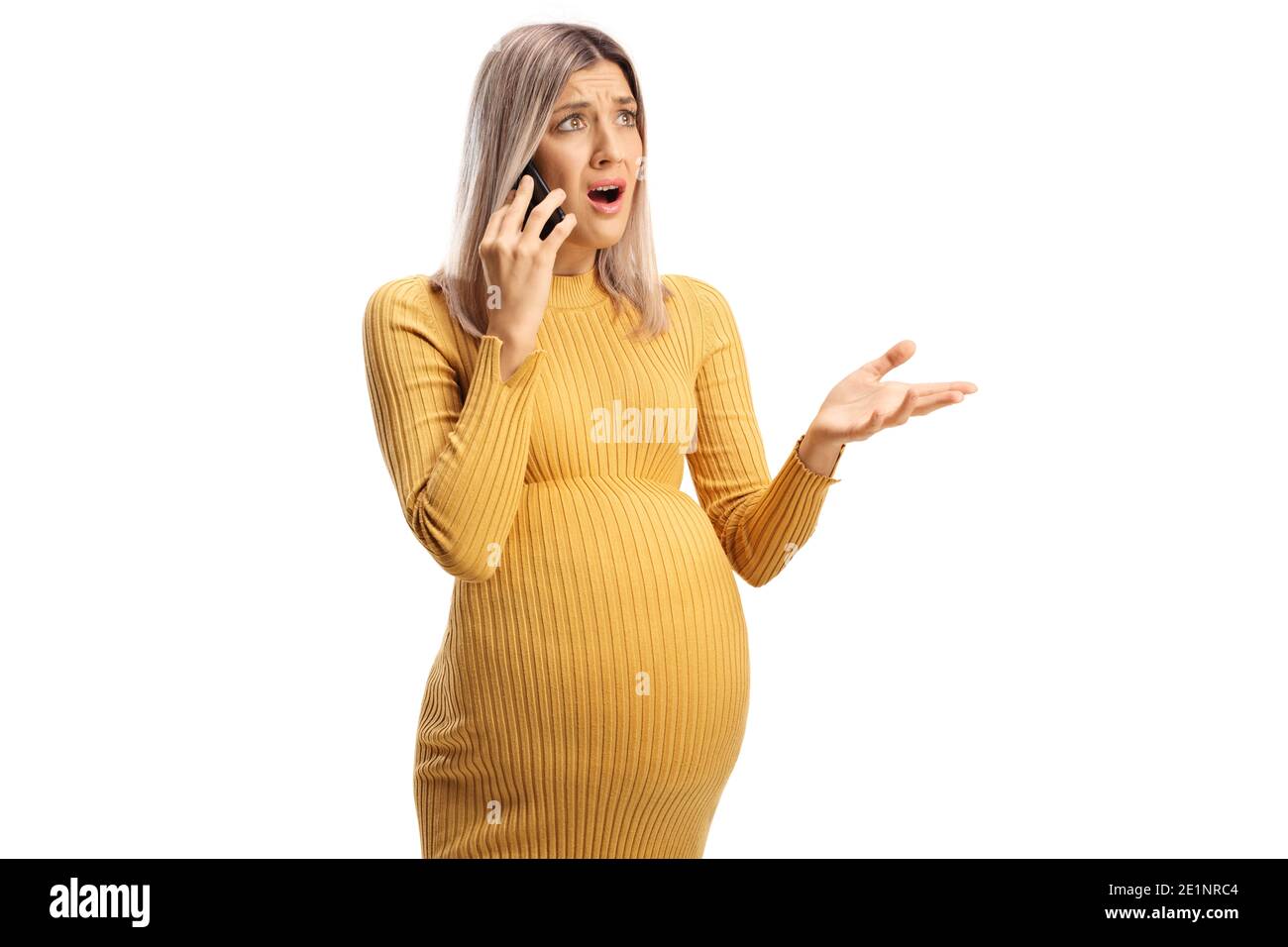 Stressed pregnant woman talking on a mobile phone isolated on white background Stock Photo