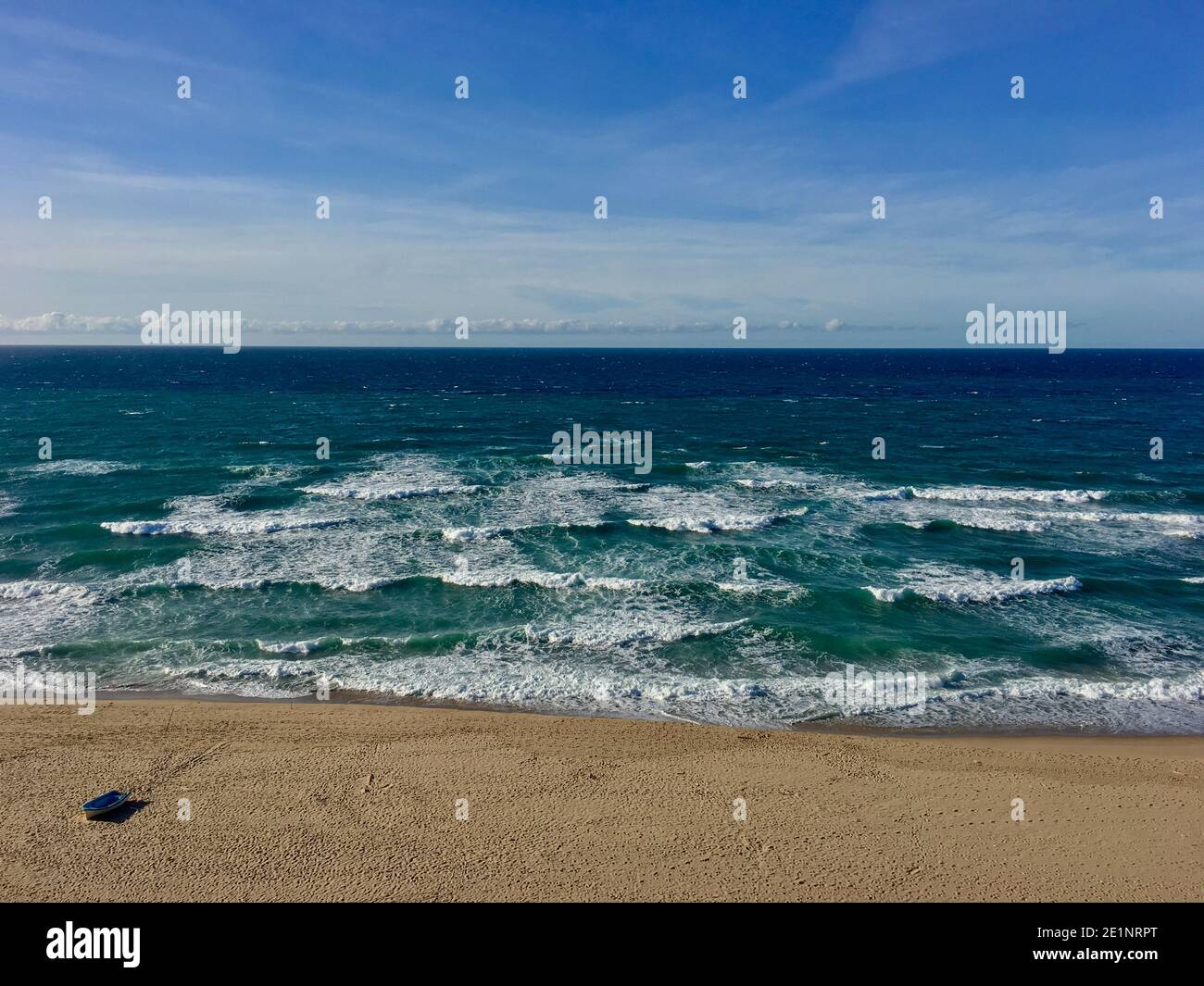 oyster shell blue times at sunset on the beach of wavy Mediterranean sea landscape panorama in Skikda Algeria Stock Photo