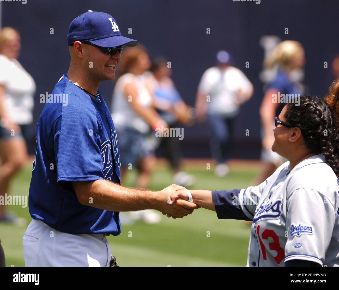 Los Angeles Dodgers outfielder Cody Ross greets women at Los Angeles Dodgers Women's Initiative & Network Baseball Clinic at Dodger Stadium in Los Ang Stock Photo