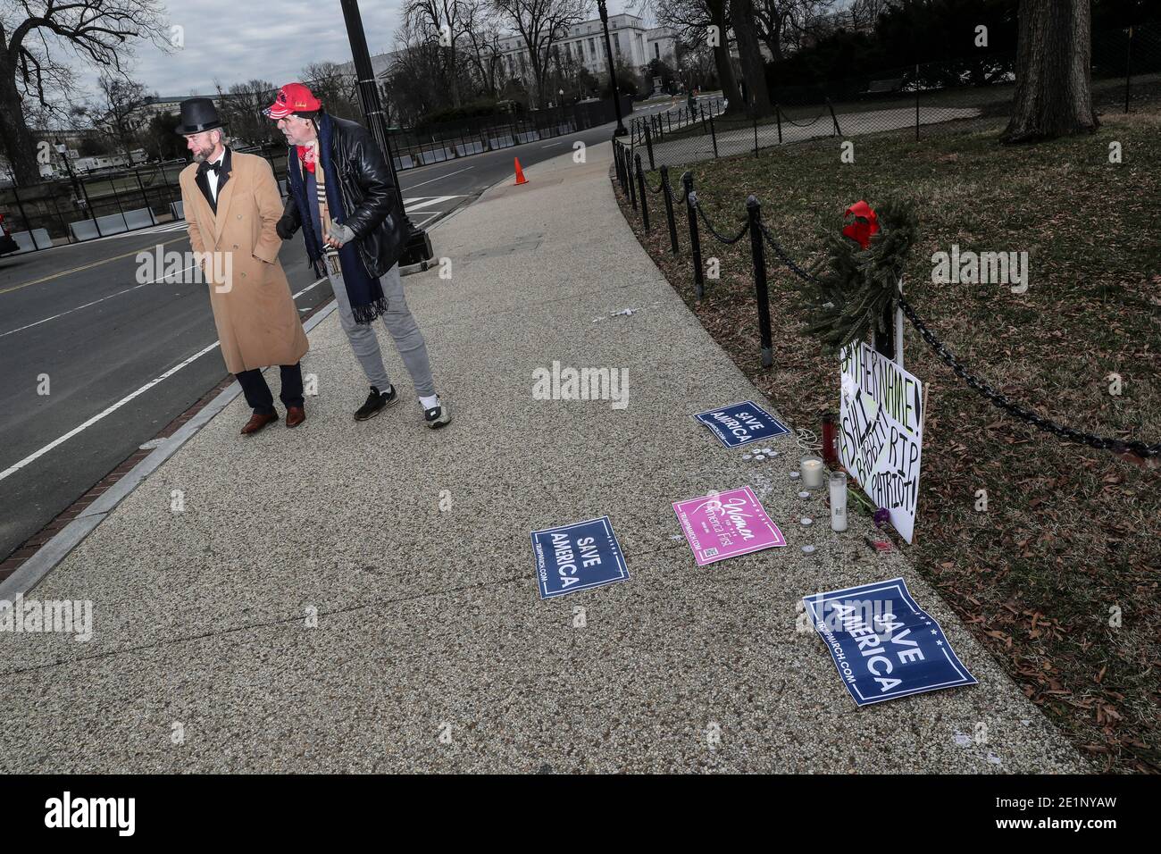Washington, USA. 08th Jan, 2021. Supporters of President Trump gather near a make-shrift shrine to Ashli Babbitt, 39, outside the U.S. Capitol on January 08, 2021 in Washington, DC. Babbitt, an Air Force veteran, was shot and killed while storming the Capitol with a pro-Trump mob two days before. (Photo by Oliver Contreras/SIPA USA) Credit: Sipa USA/Alamy Live News Stock Photo