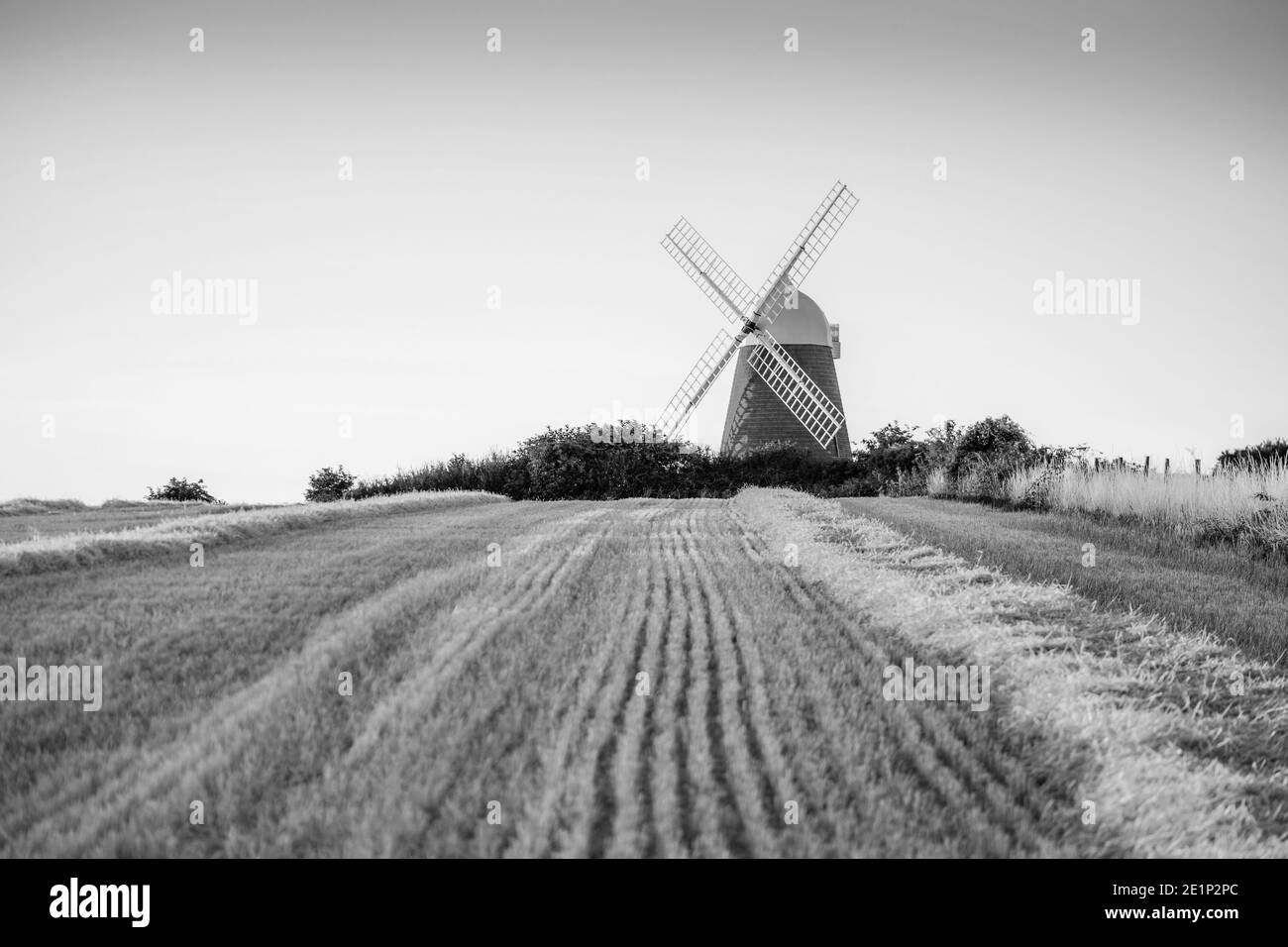 Halnaker Windmill in black and white / monochrome on top of Halnaker Hill in West Sussex, England, UK Stock Photo