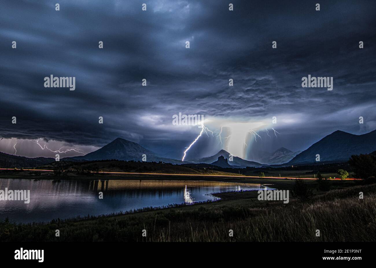 Lightning strike over a volcano Stock Photo
