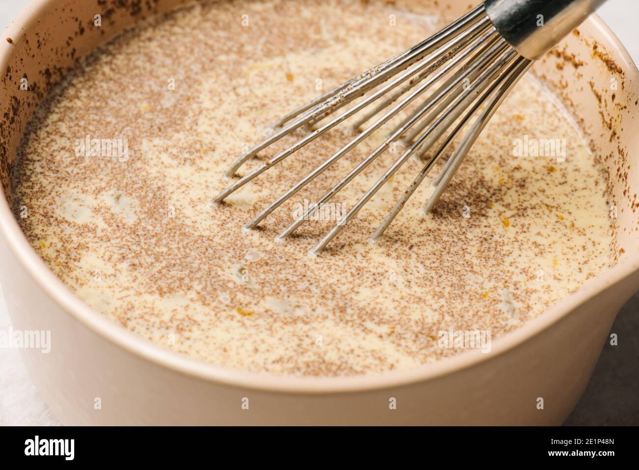 https://c8.alamy.com/comp/2E1P48N/french-toast-egg-bath-with-wire-whisk-2E1P48N.jpg