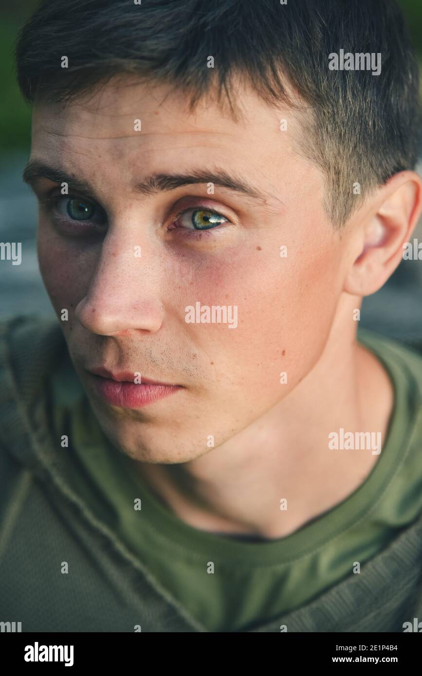Green-eyed country boy at sunset Stock Photo
