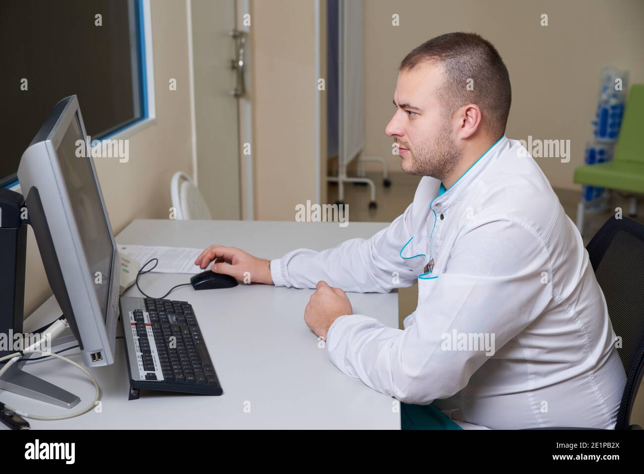 Pediatrician working computer table hi-res stock photography and images ...
