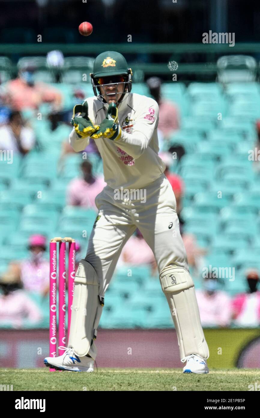 Tim paine of australia catches the ball hi-res stock photography and ...