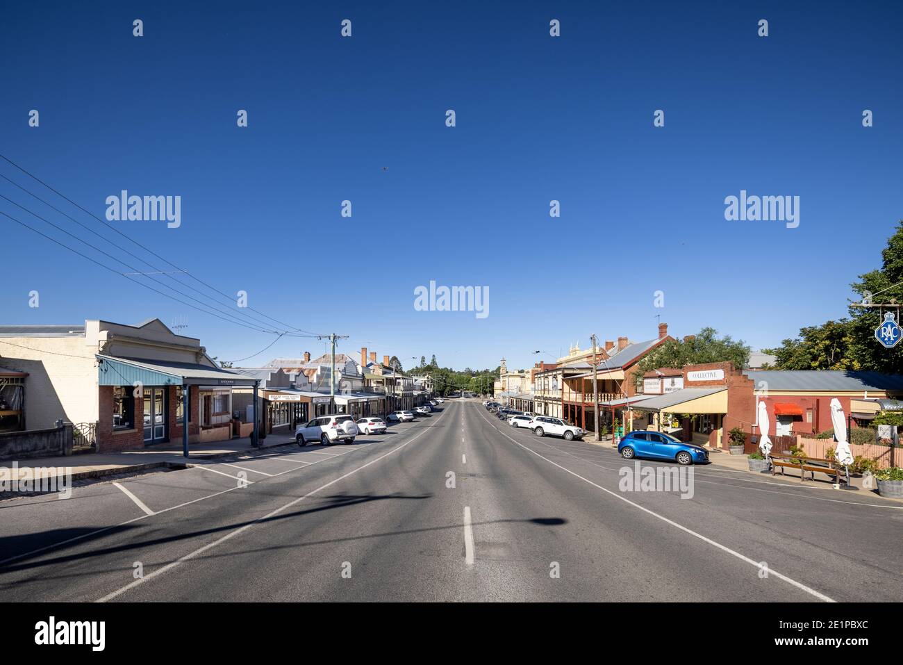 Looking straight down the main street in Beechworth, Victoria, Australia; the historic post office building can be seen in the background. Stock Photo