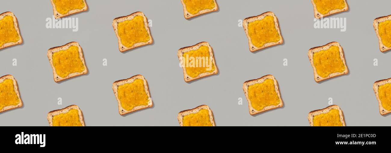 Pattern with toast and lemon jam on gray background Stock Photo