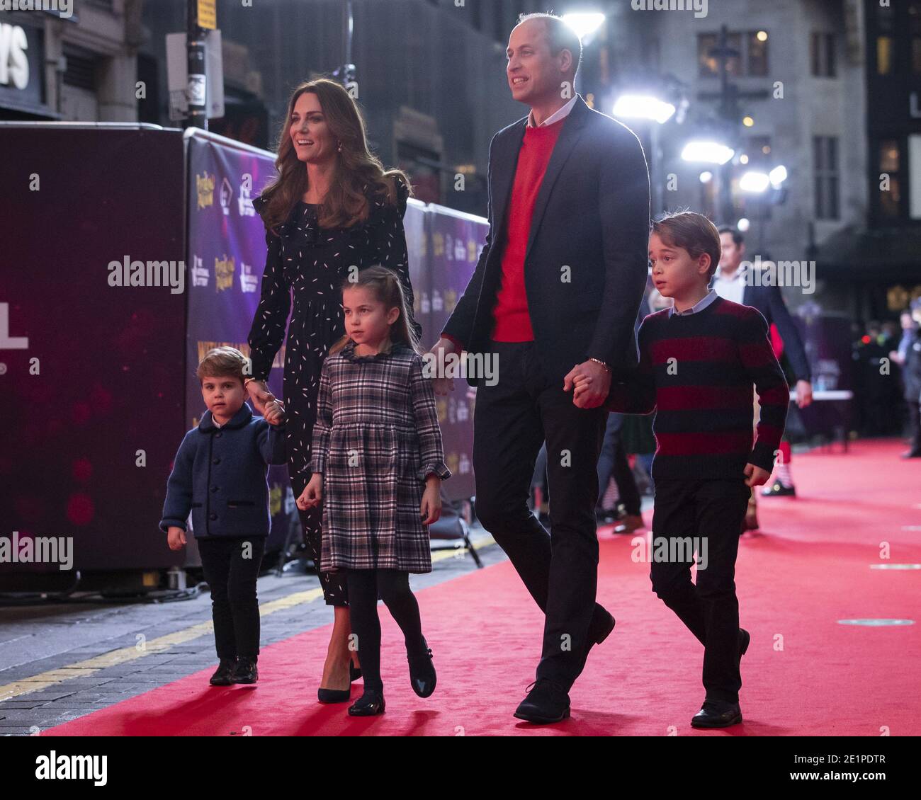 File photo dated 11/12/20 of the Duke and Duchess of Cambridge and their children, Prince Louis, Princess Charlotte and Prince George attending a special pantomime performance at London's Palladium Theatre, hosted by The National Lottery, to thank key workers and their families for their efforts throughout the pandemic. The Duchess of Cambridge celebrates her 39th birthday as the royal family, like the rest of nation, continues to live under lockdown. Stock Photo