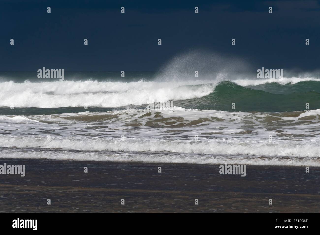 Wind blown breaking waves in the Pacific Ocean at Herbertville, Tararua Distirct, North Island, New Zealand Stock Photo