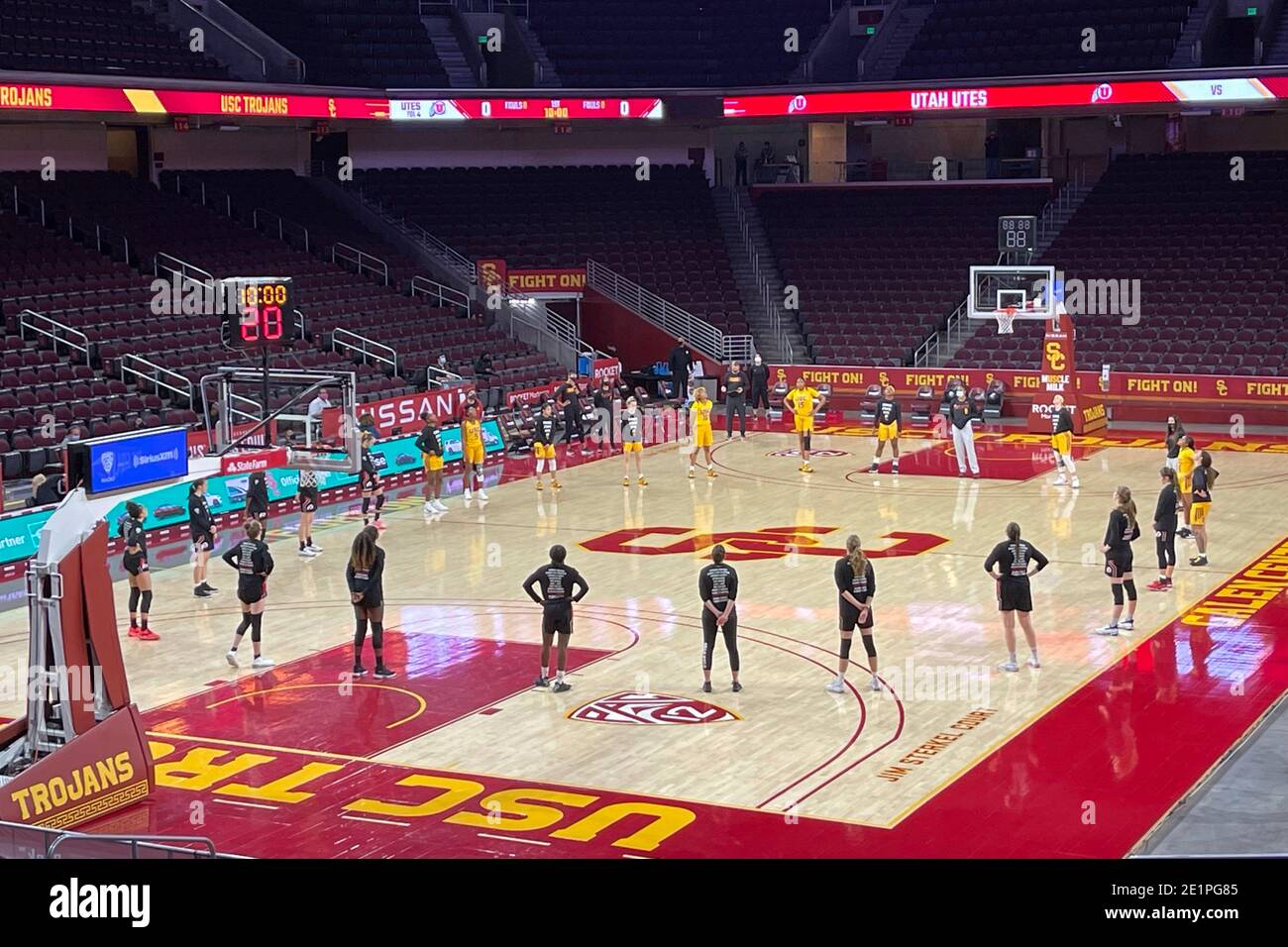 Utah Utes and Southern California Trojans players stand in a circle of solidarity against racial injustice before an NCAA college women's basketball g Stock Photo