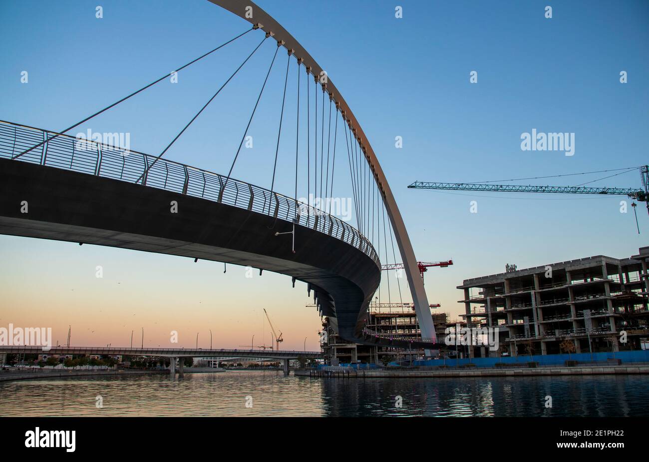 Dubai, UAE - 01.08.2021 Bridge over a Dubai Water canal known as Tolerance bridge Stock Photo