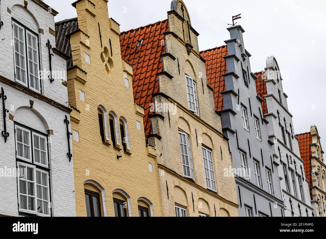 A row of historic gabled houses on the market square in Friedrichstadt, Schleswig-Holstein, Germany Stock Photo