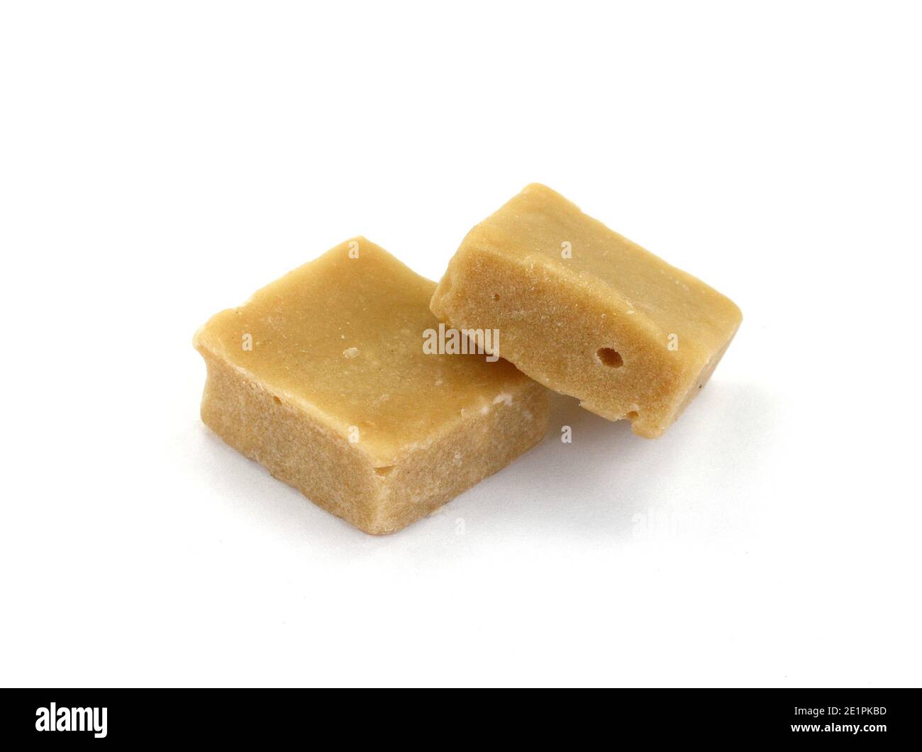 Sweet caramel candies isolated on white background Stock Photo - Alamy