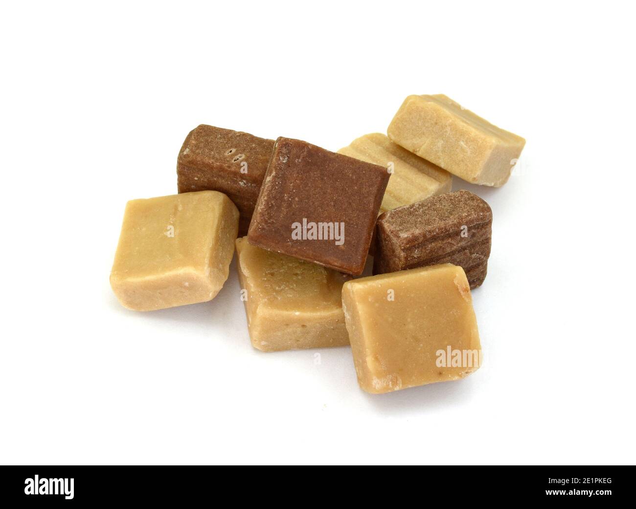 Sweet caramel candies isolated on white background Stock Photo - Alamy