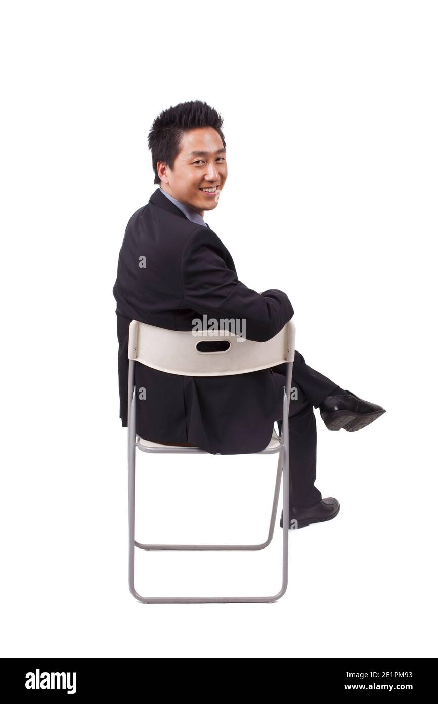Photo cheerful man sitting hi-res stock photography and images - Alamy