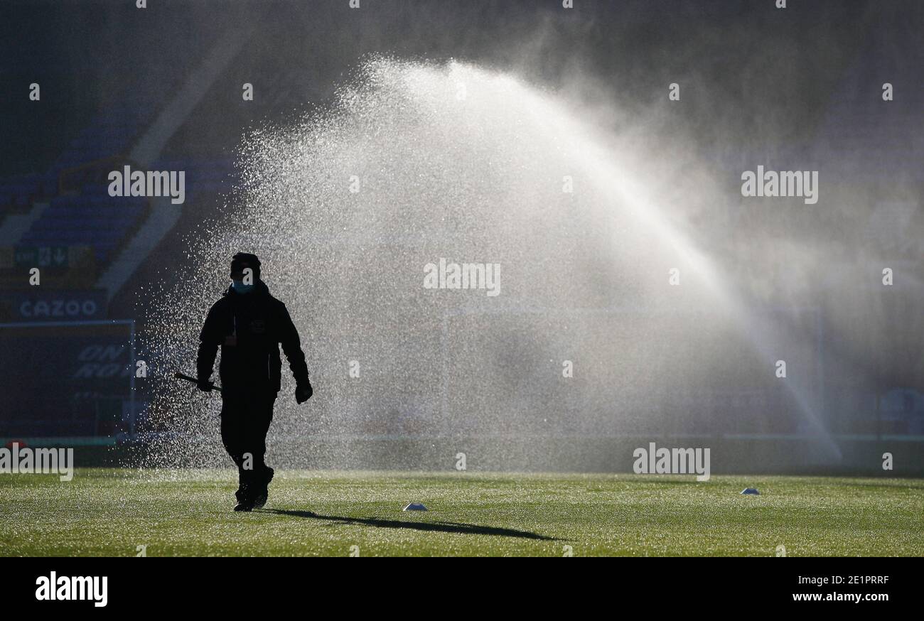 Soccer Football - FA Cup Third Round - Everton v Rotherham United - Goodison Park, Liverpool, Britain - January 9, 2021 General view of a member of staff on the pitch before the match REUTERS/Phil Noble Stock Photo