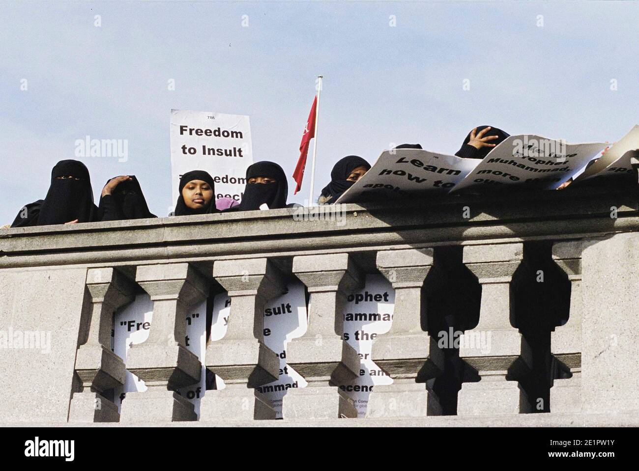 The Islamaphobia rally organised by moderate Muslim groups, Muslim sisters at demonstration protest about offending danish cartoons, with Hijab Headdress. The Jyllands-Posten Muhammad cartoons controversy began after the Danish newspaper Jyllands-Posten published 12 editorial cartoons Stock Photo