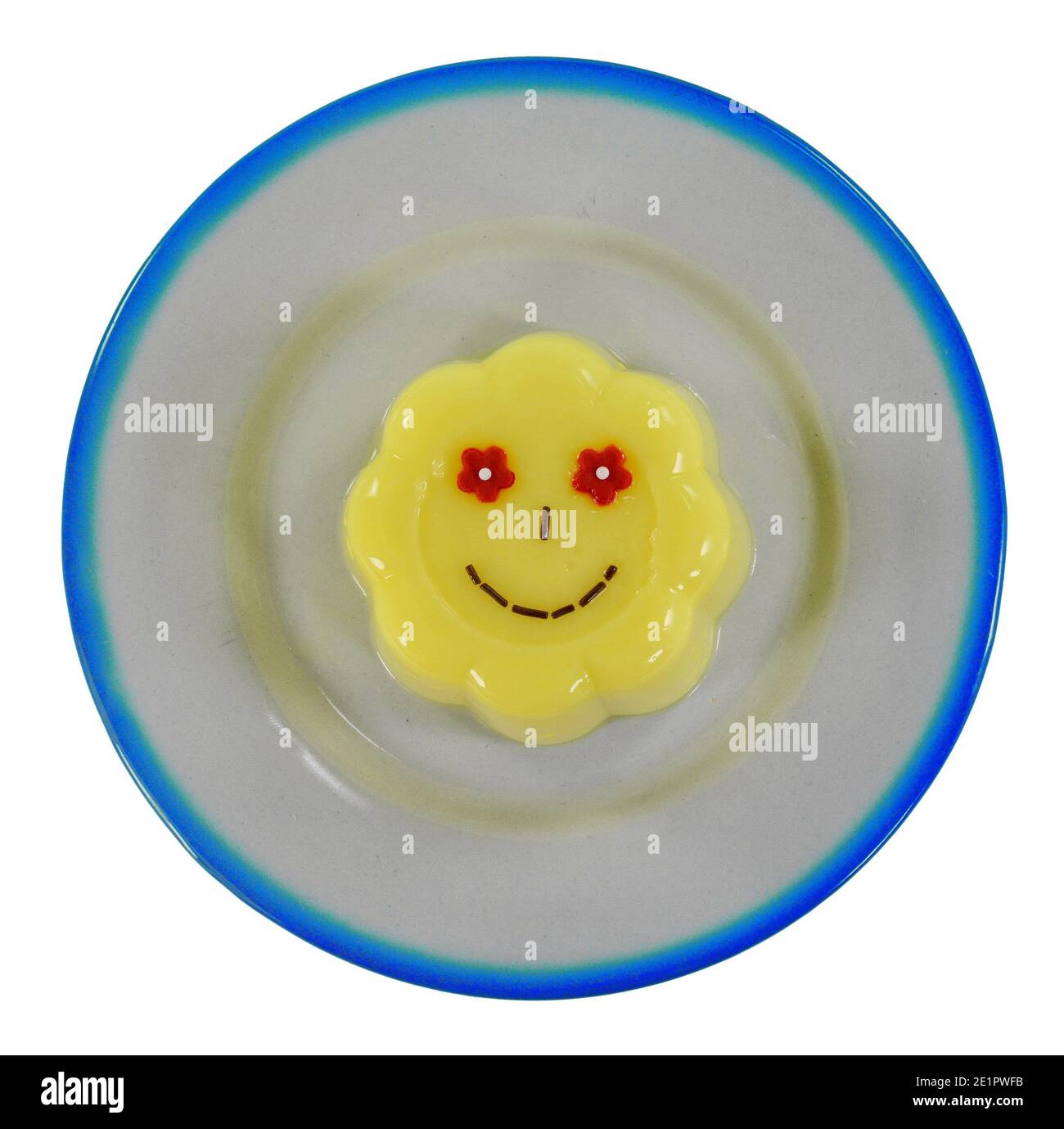 Vanilla pudding with smiles isolated on white background Stock Photo