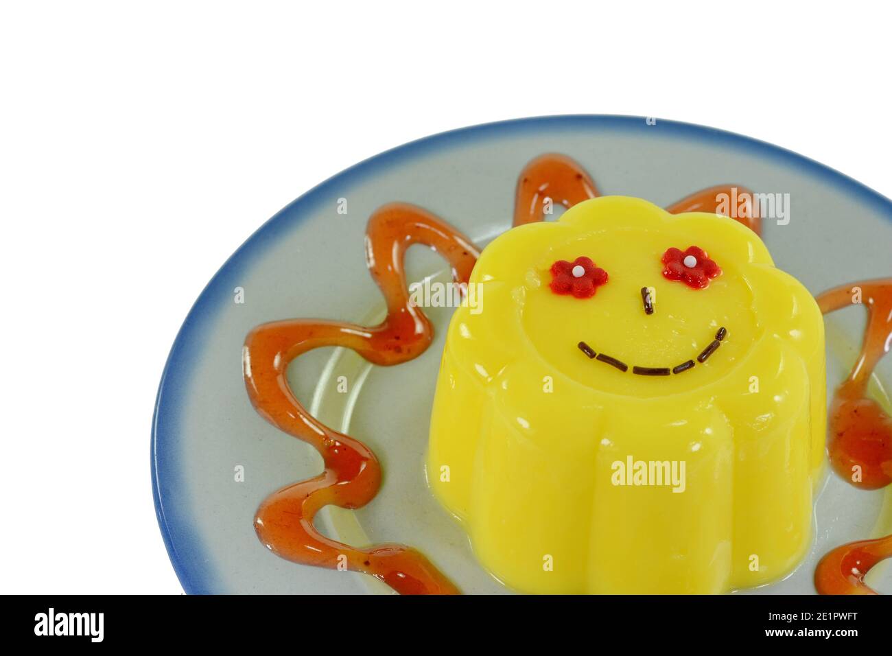 Vanilla pudding with smiles isolated on white background Stock Photo