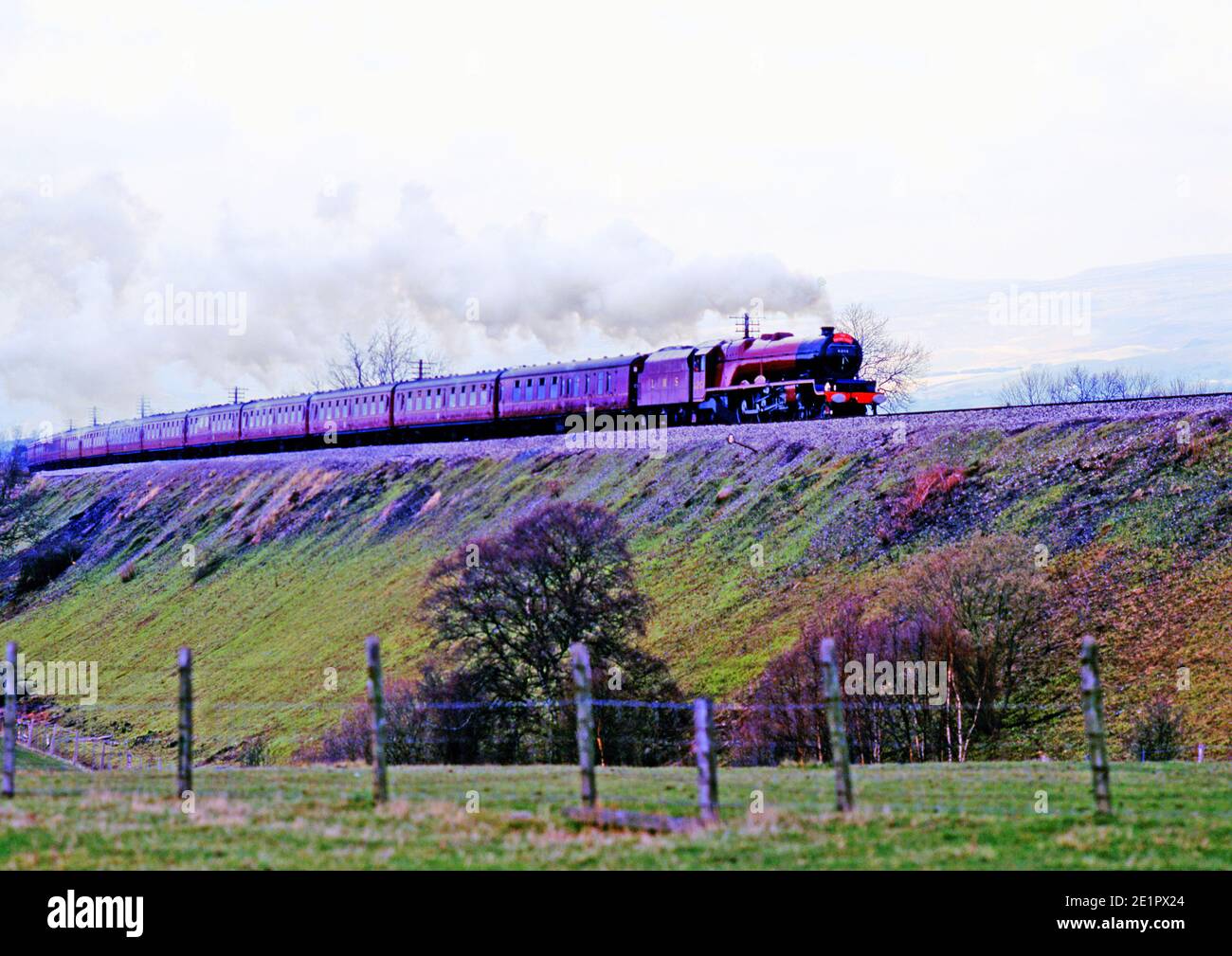 Steam Train approaching Ormside, Settle to Carlisle Railway, England Stock Photo