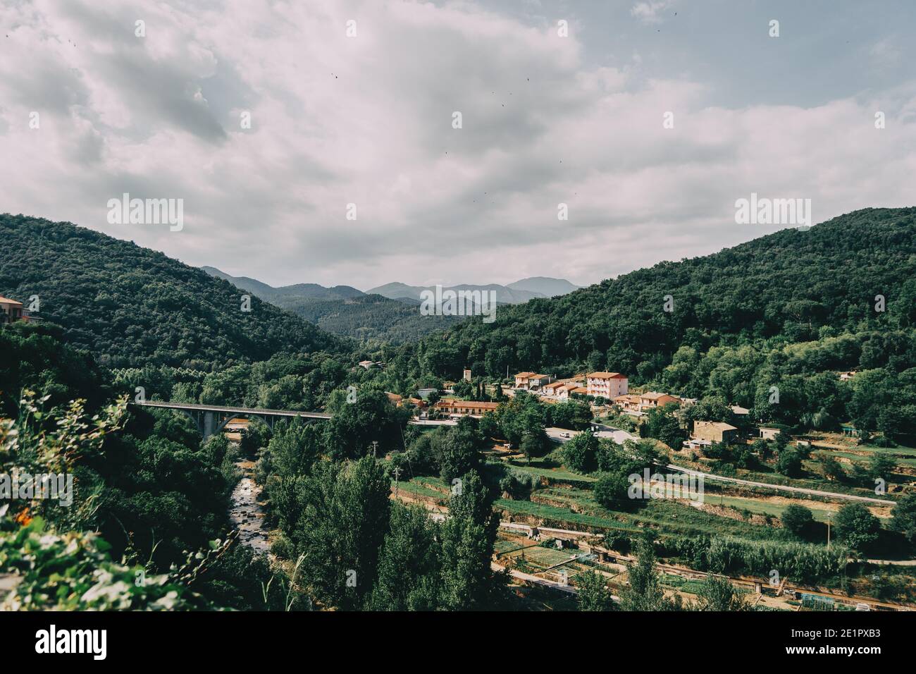 mountains of sadernes on a cloudy summer day in spain Stock Photo - Alamy