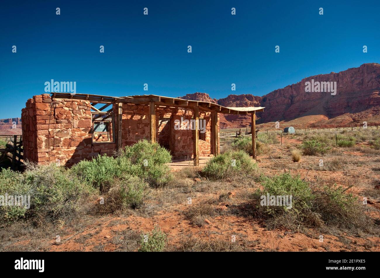 Ruined house at abandoned ranch near Jacobs Pool water well at